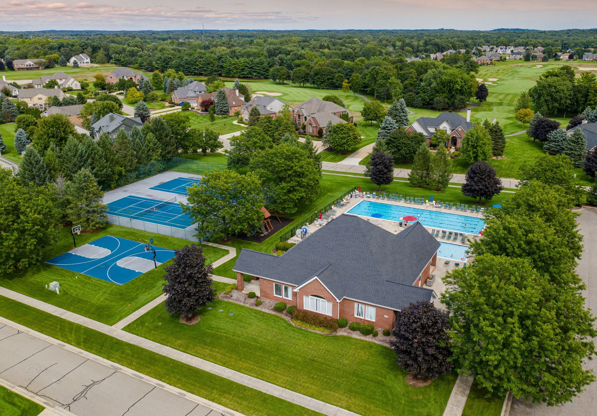 aerial of Prestwick Village pool, tennis court, and basketball courts